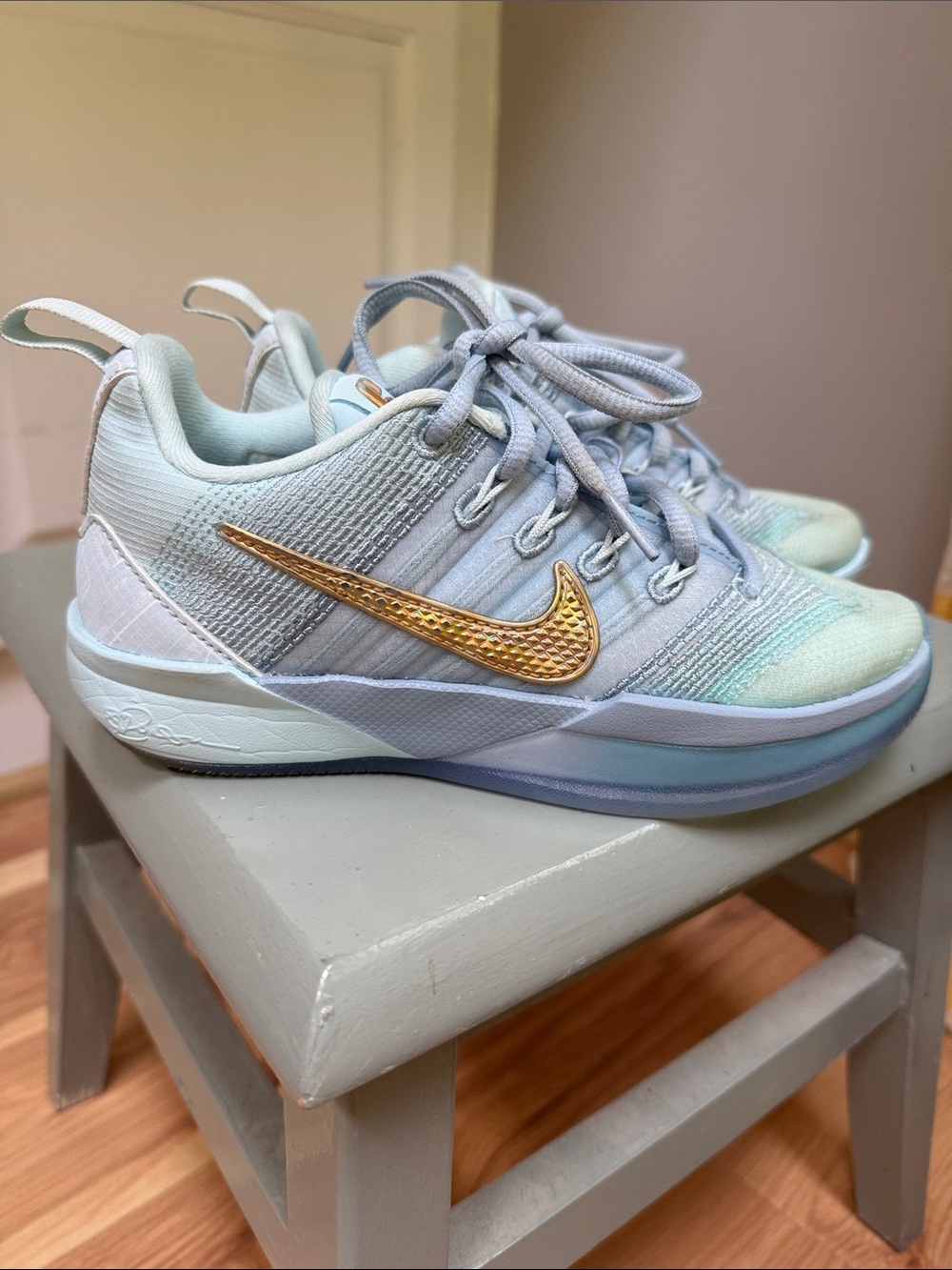 Nike Kids Light Blue Sneakers with Gold Swoosh